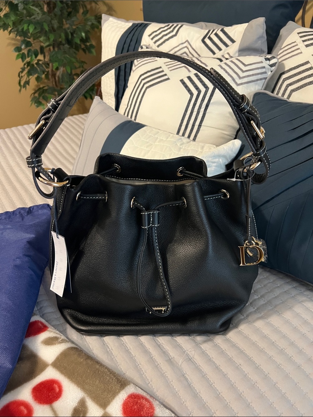 Dooney & Bourke Black Pebble Leather Drawstring Shoulder Bag with Gold Charm
